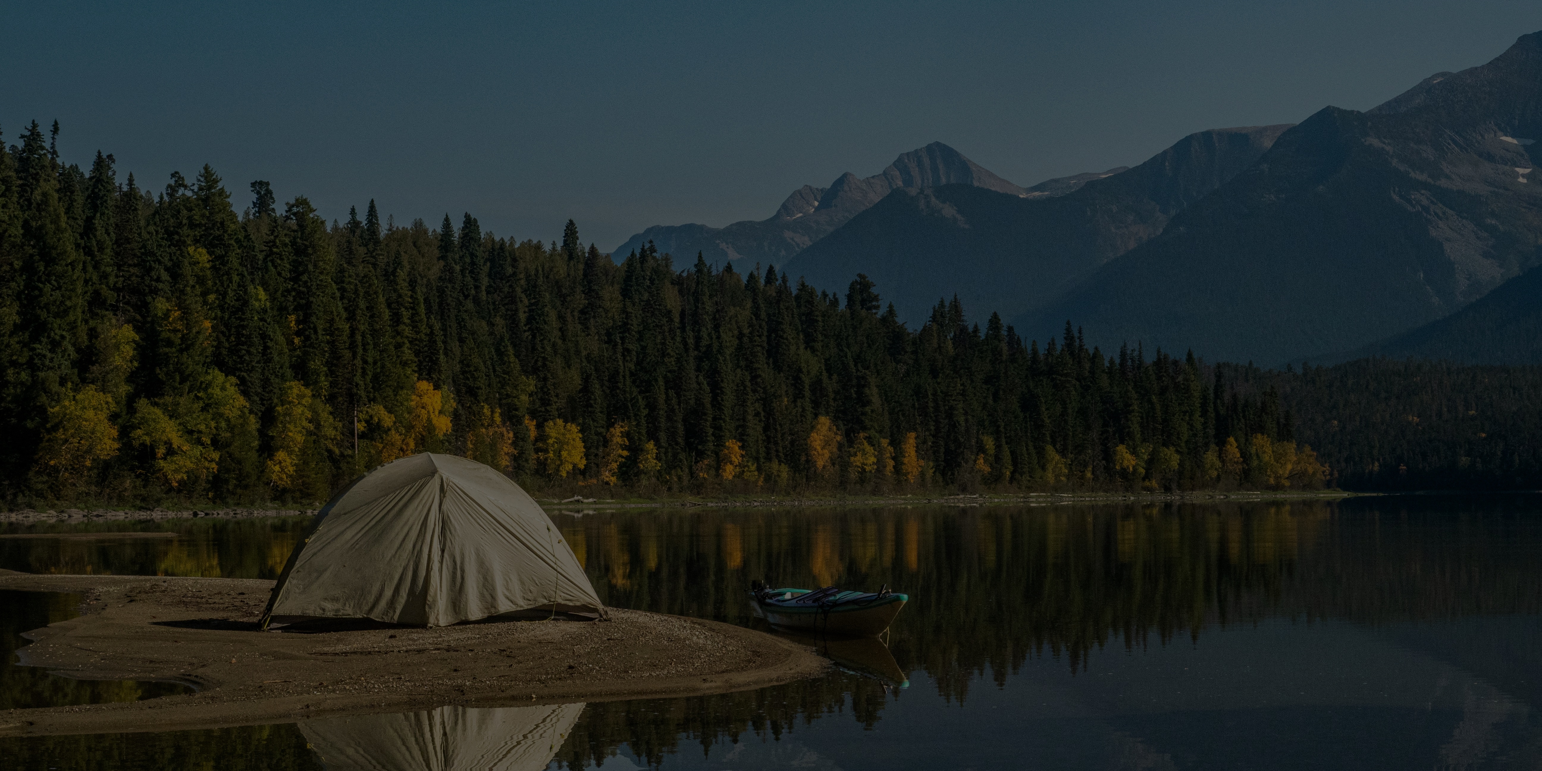 Camping by the lake in the mountains